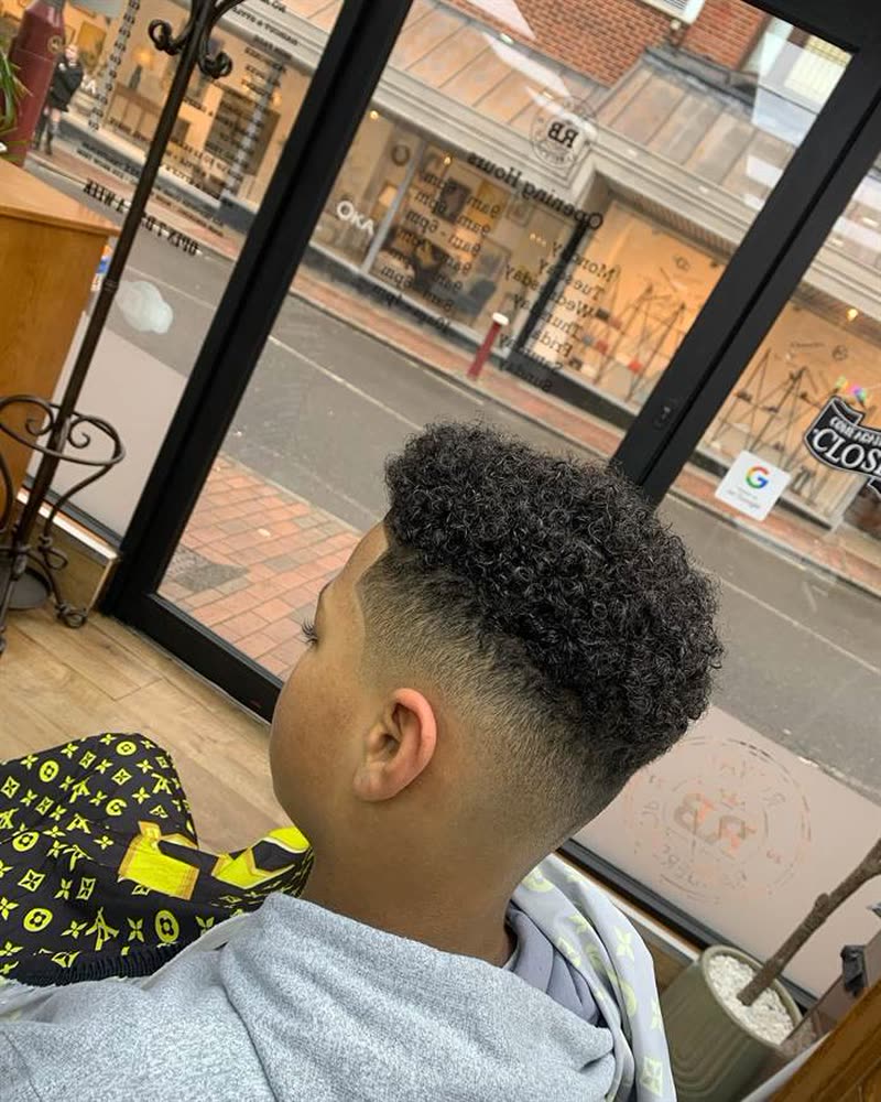 Afro top with a drop fade