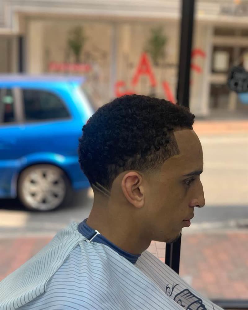 Short curls with a low fade