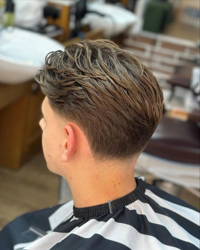 Back view of a textured top with a clean taper